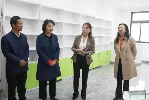 扬州市政协调研仪征新集陆琴培训学校.png